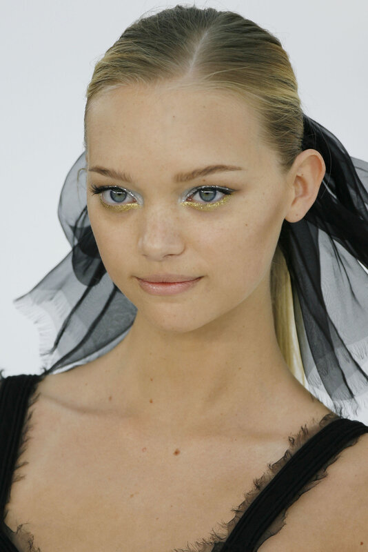 model with gold eye makeup