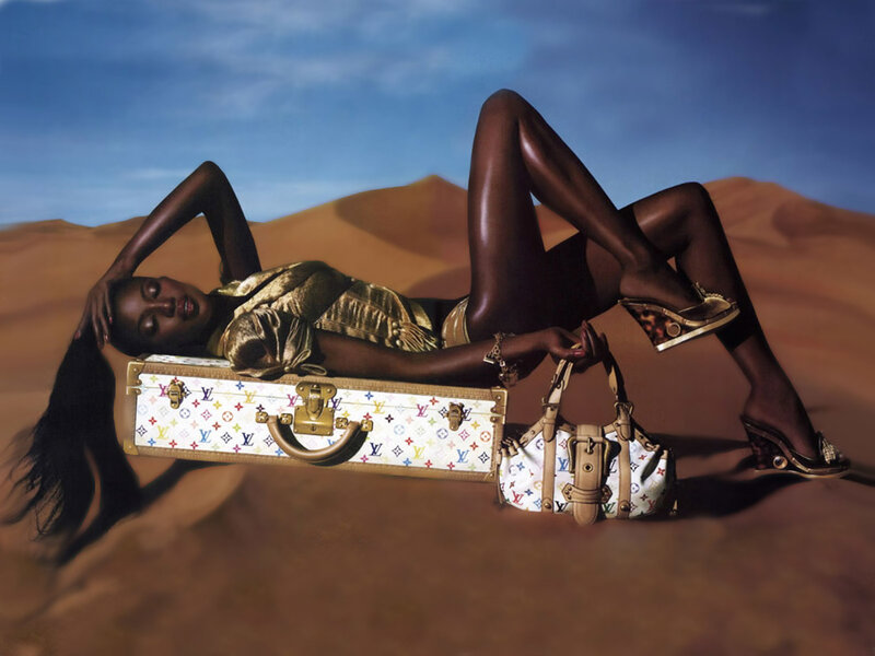 Model with Louis Vuitton luggage