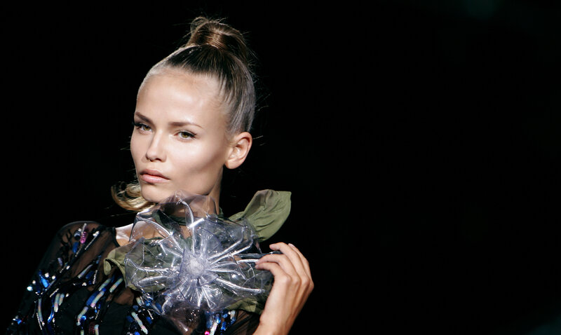 model with plastic flower accessory
