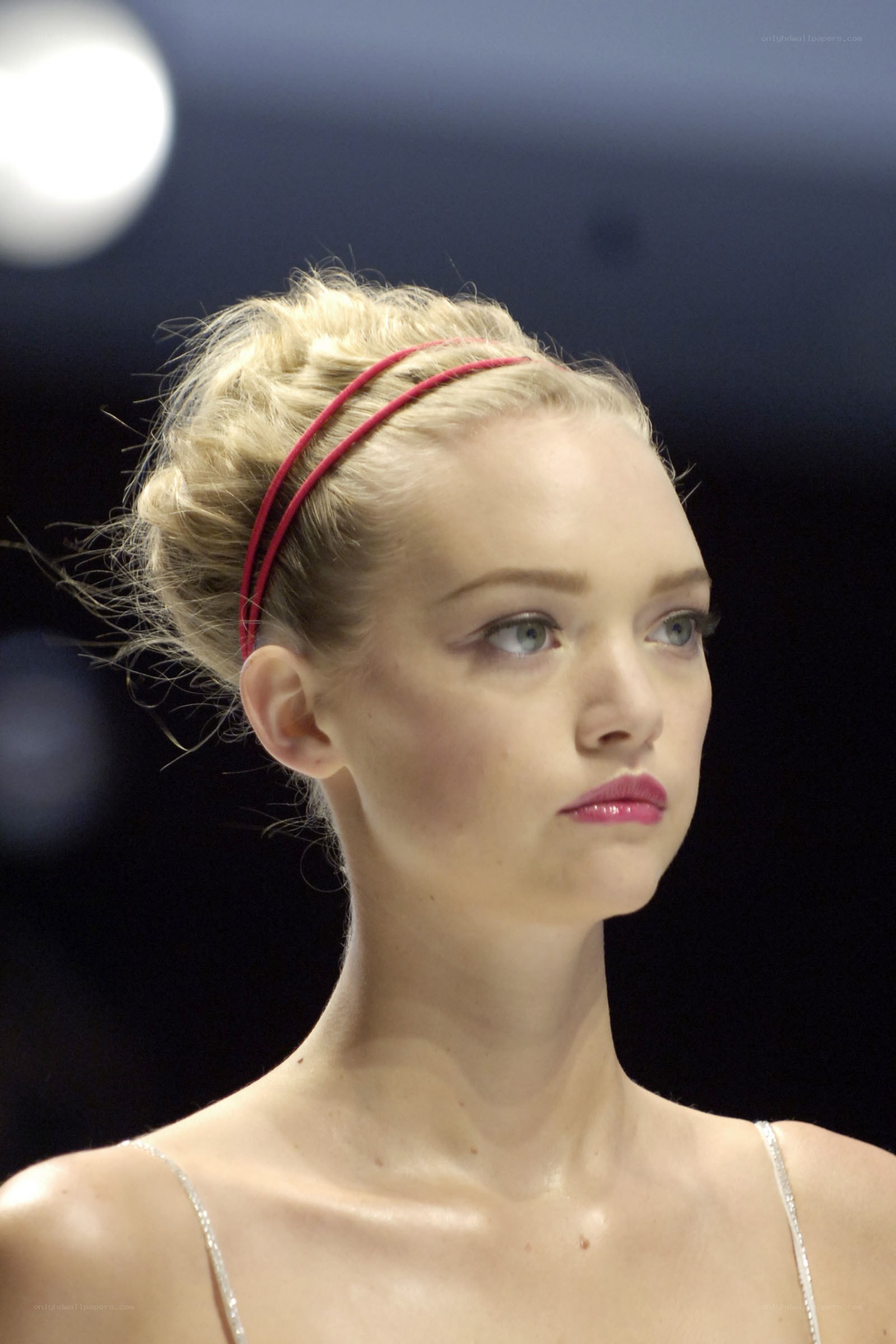 model with red headband