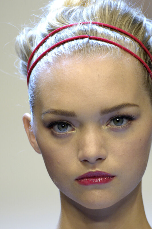 model with red headband