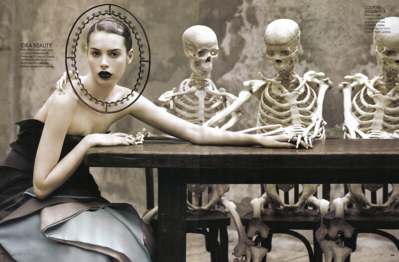 Model with skeletons at table
