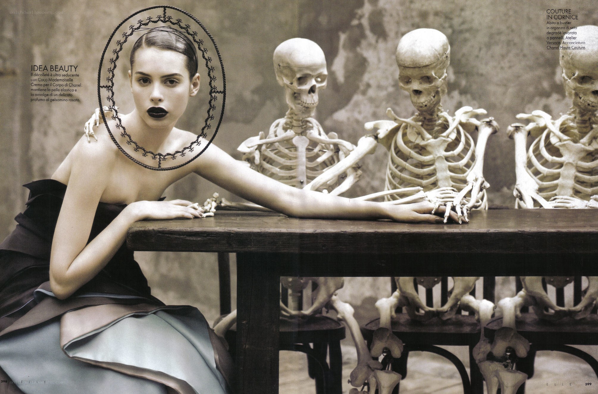 Model with skeletons at table