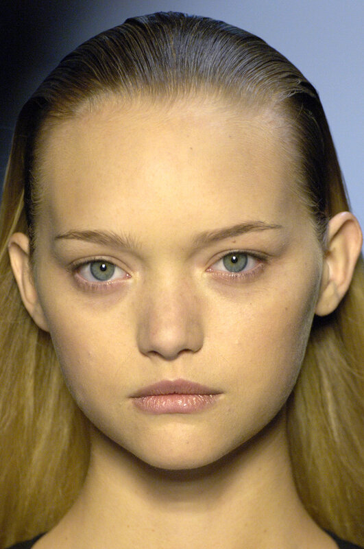 model with slicked-back hair