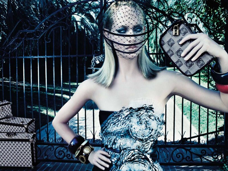 model with veil and luxury bags