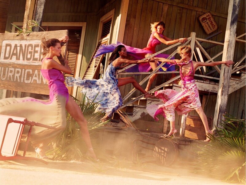 Models in colorful dresses on porch