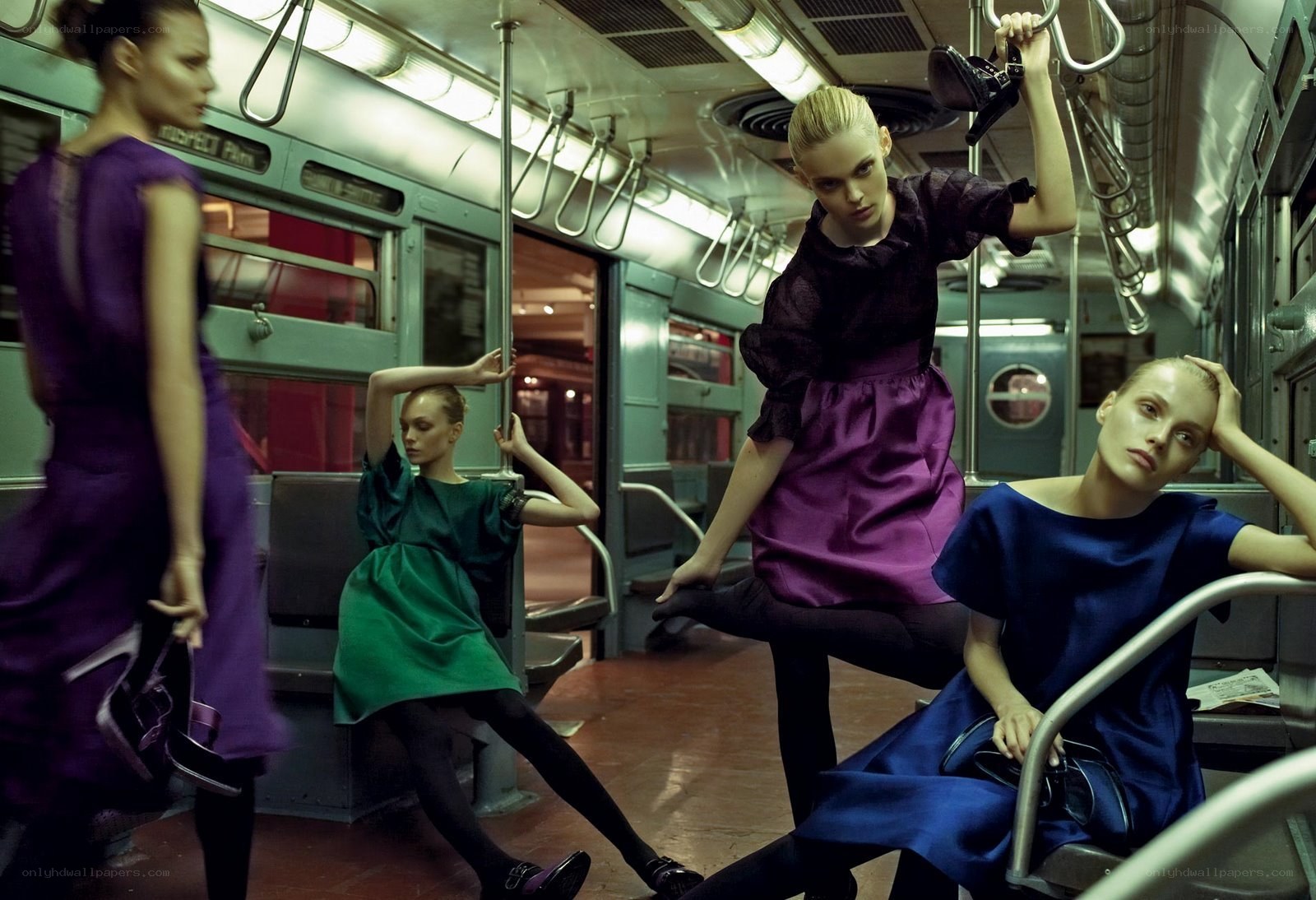 Models in subway fashion shoot