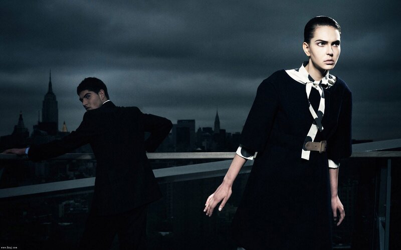 models on a rooftop at night