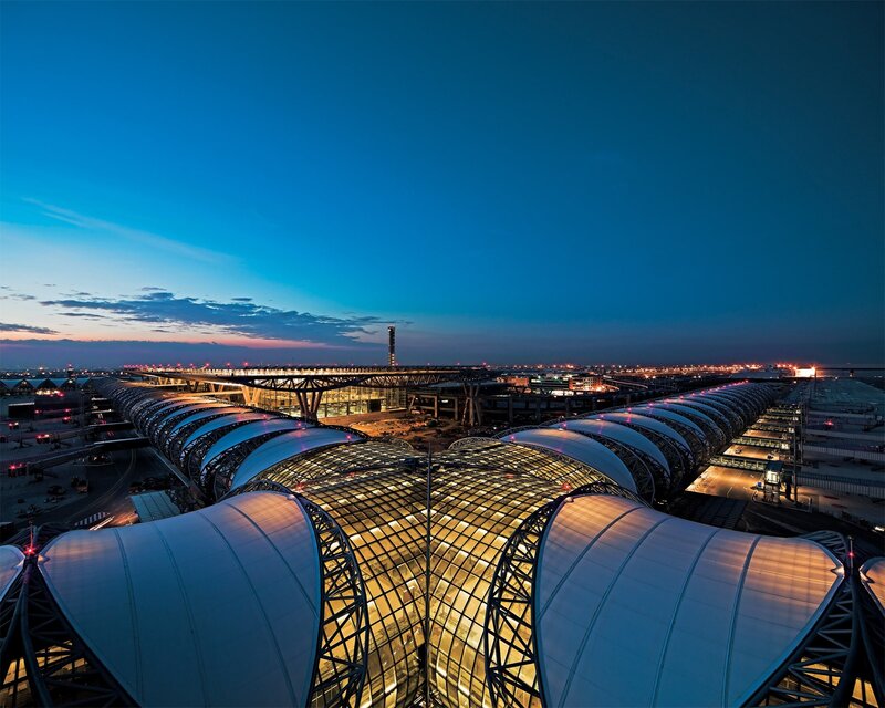 modern airport terminal at dusk