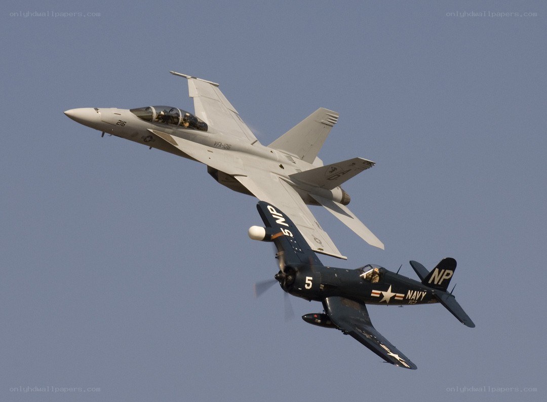 modern and vintage jets in flight