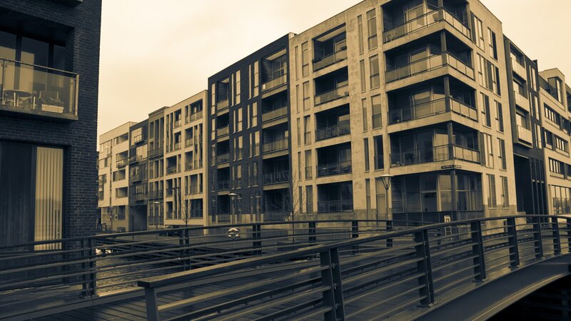 modern apartment buildings by a canal
