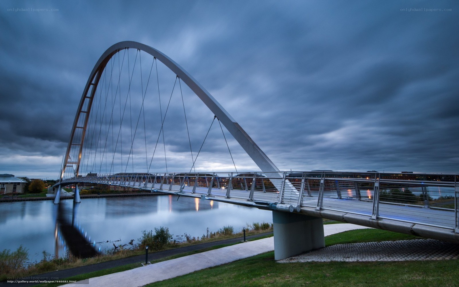Modern arch bridge over river