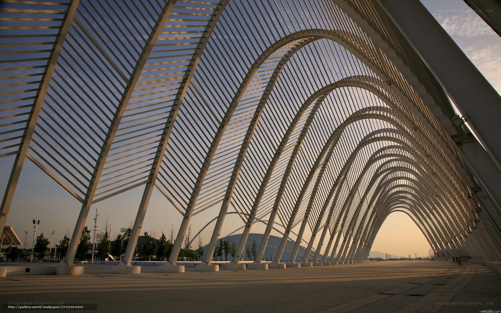 Modern architectural arches at sunset