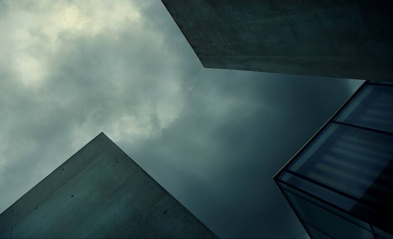Modern architecture under cloudy sky