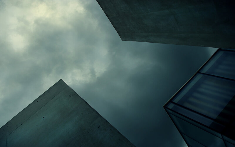 Modern architecture under cloudy sky