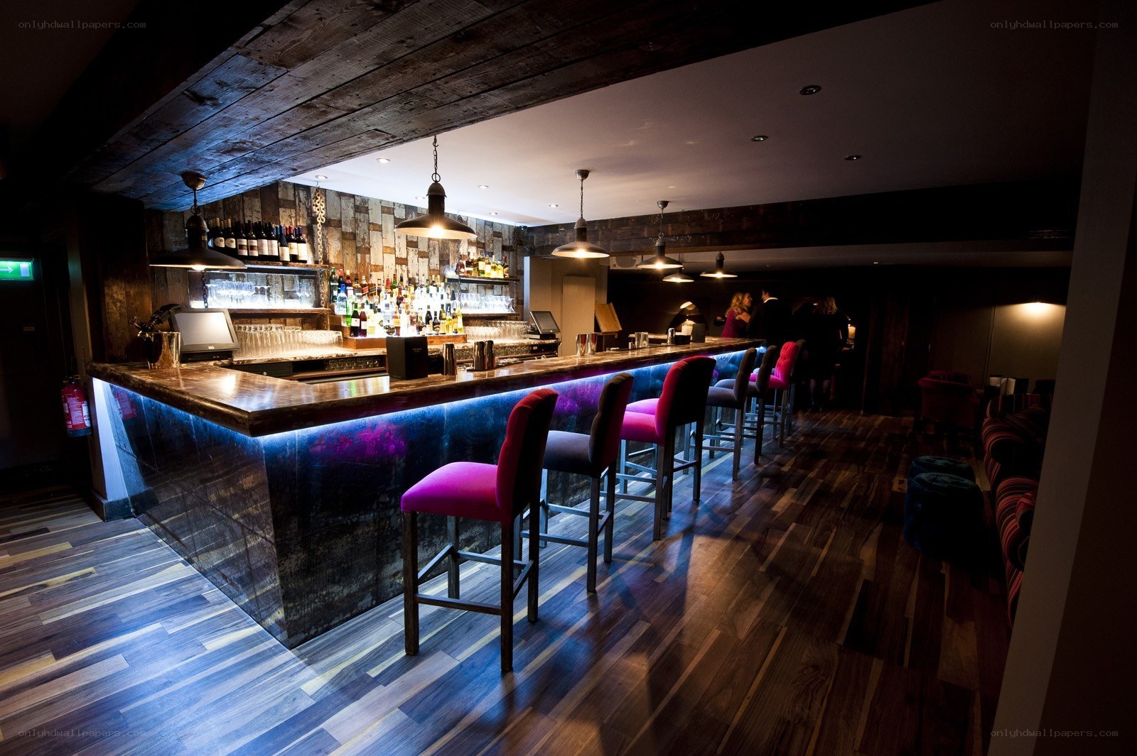 modern bar with colorful stools