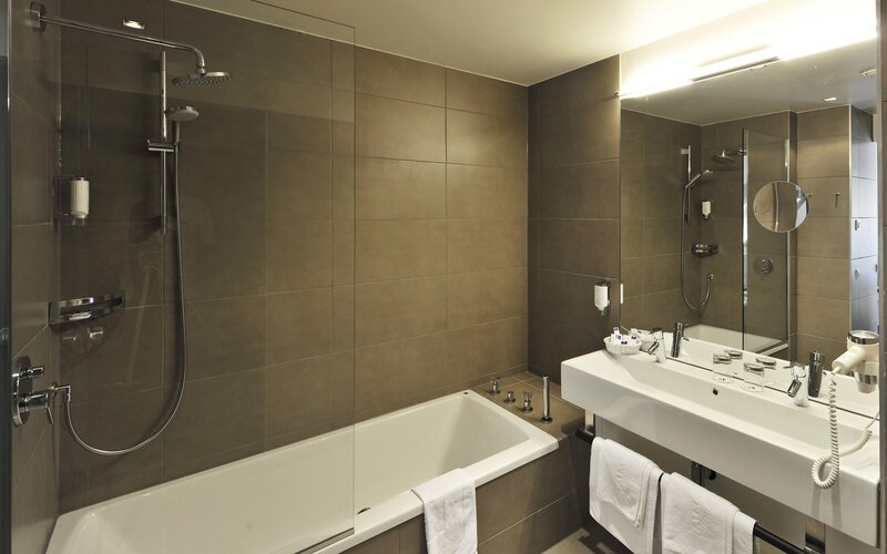 Modern bathroom with bathtub and shower