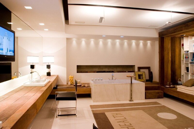 Modern bathroom with bathtub and TV