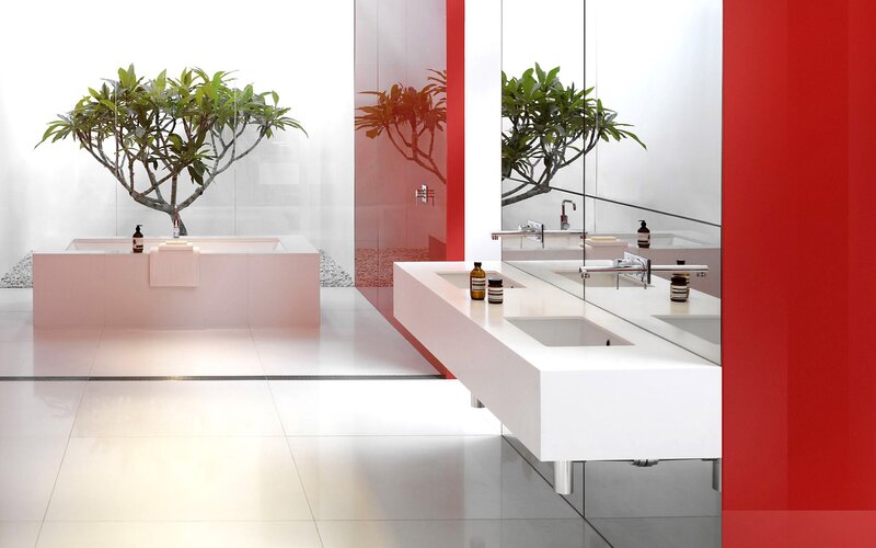 Modern bathroom with pink tub