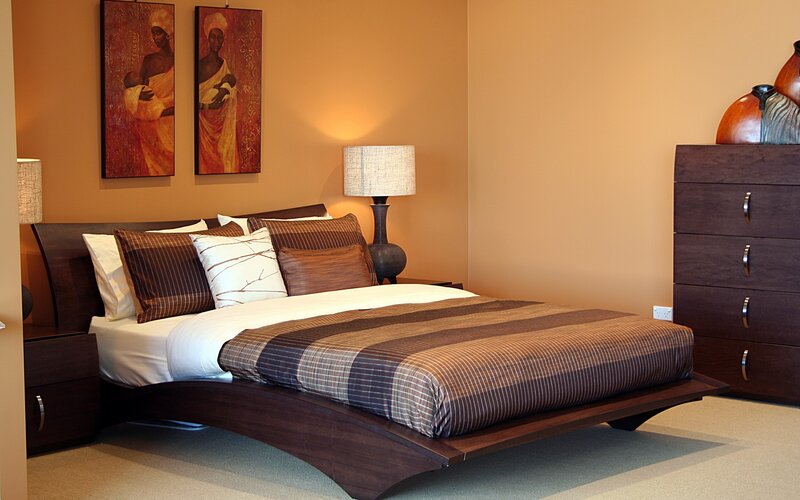 Modern bedroom with African art