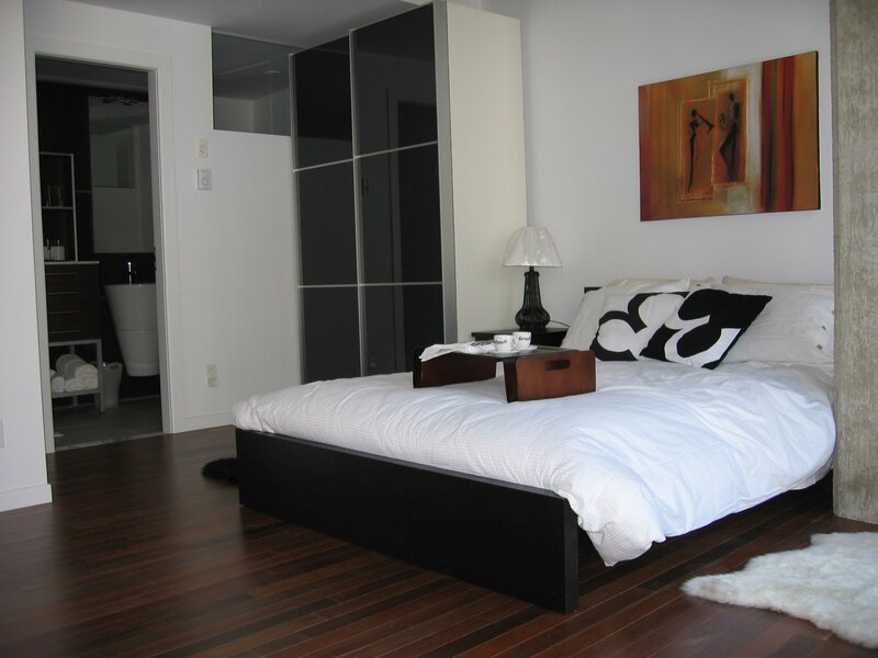 Modern bedroom with black and white decor