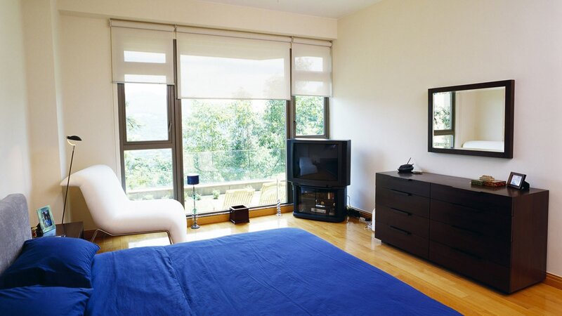 Modern bedroom with blue bed