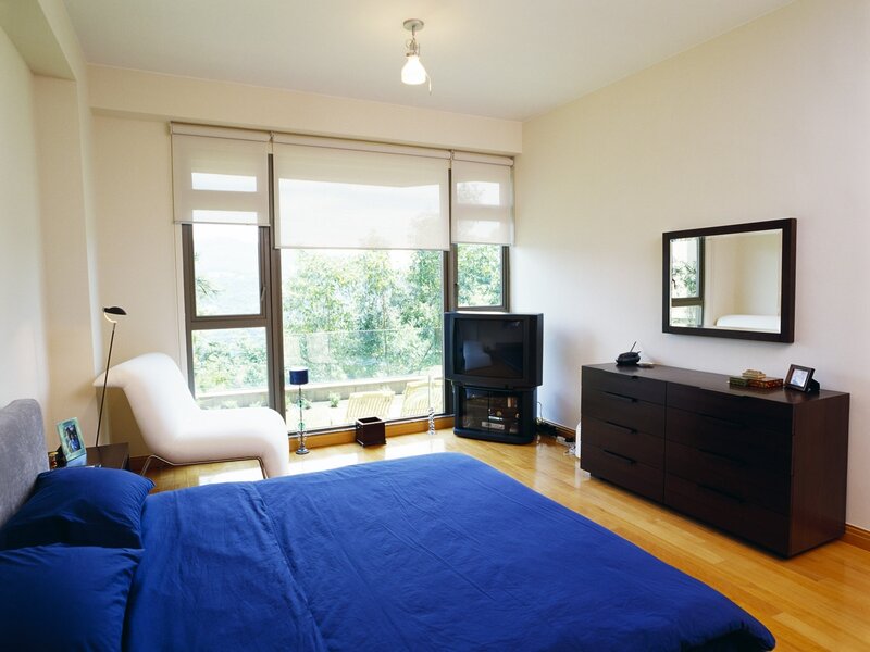 Modern bedroom with blue bedding
