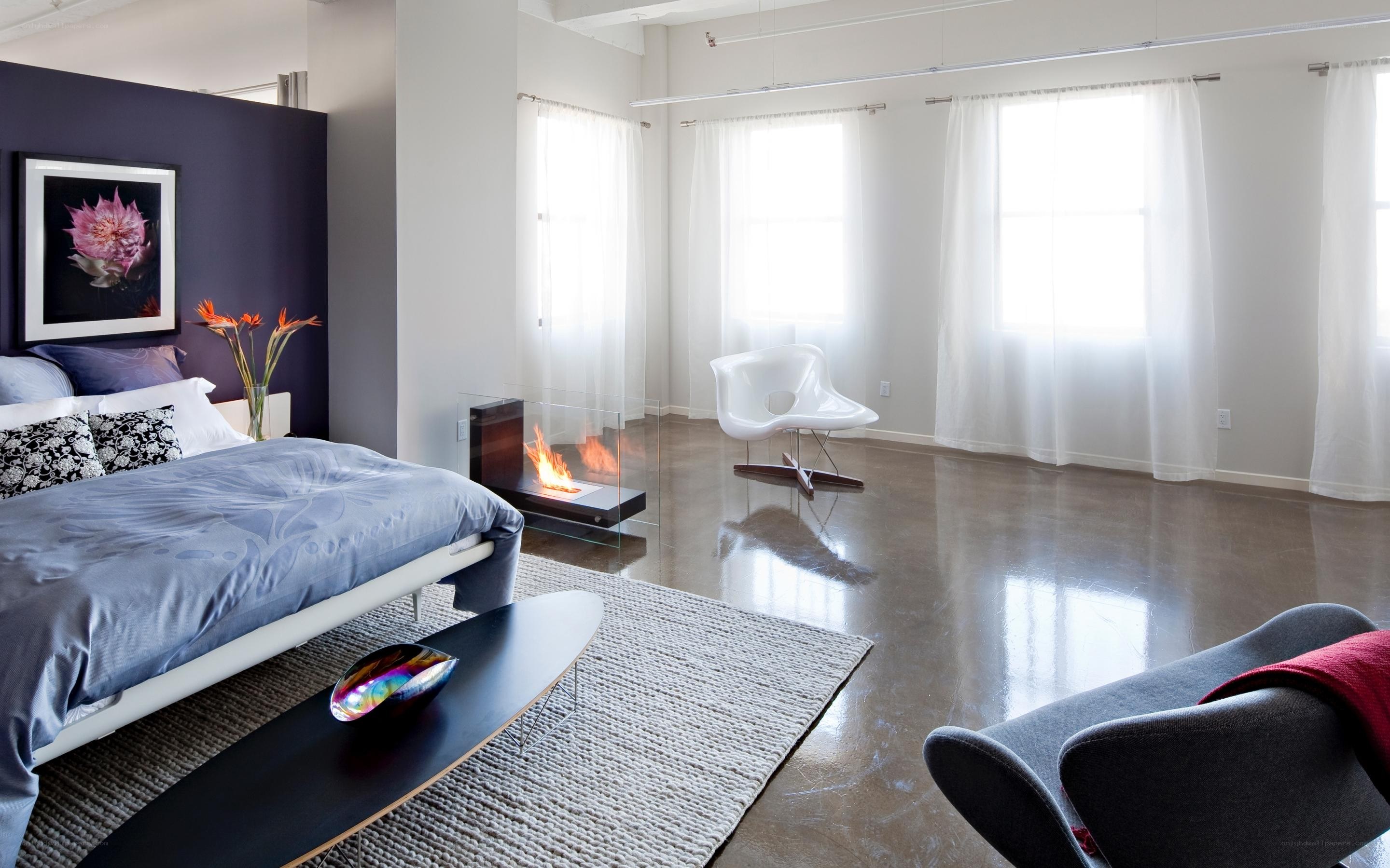 Modern bedroom with fireplace