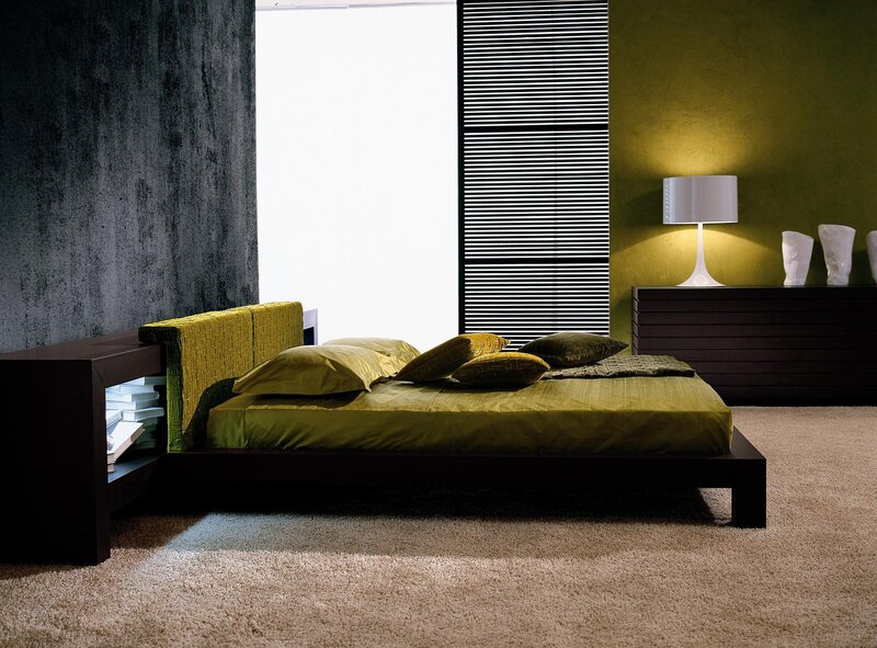 modern bedroom with green accents