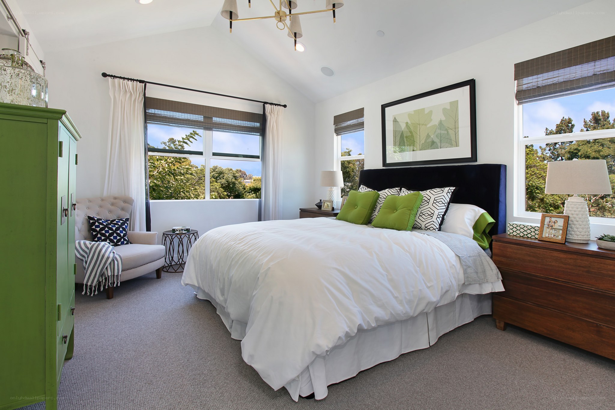 Modern bedroom with green accents