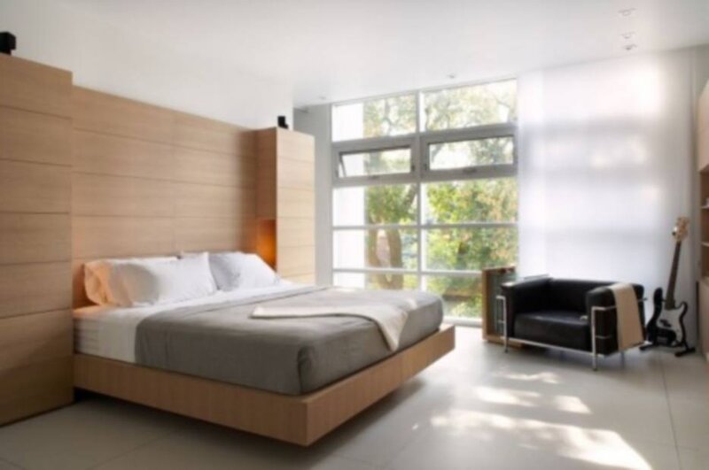 Modern bedroom with large window