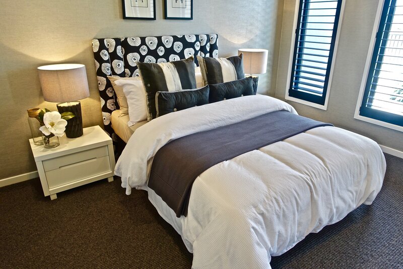 Modern bedroom with patterned headboard