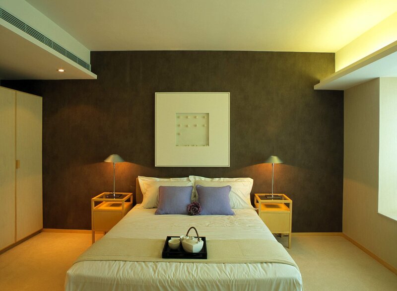 Modern bedroom with purple accents