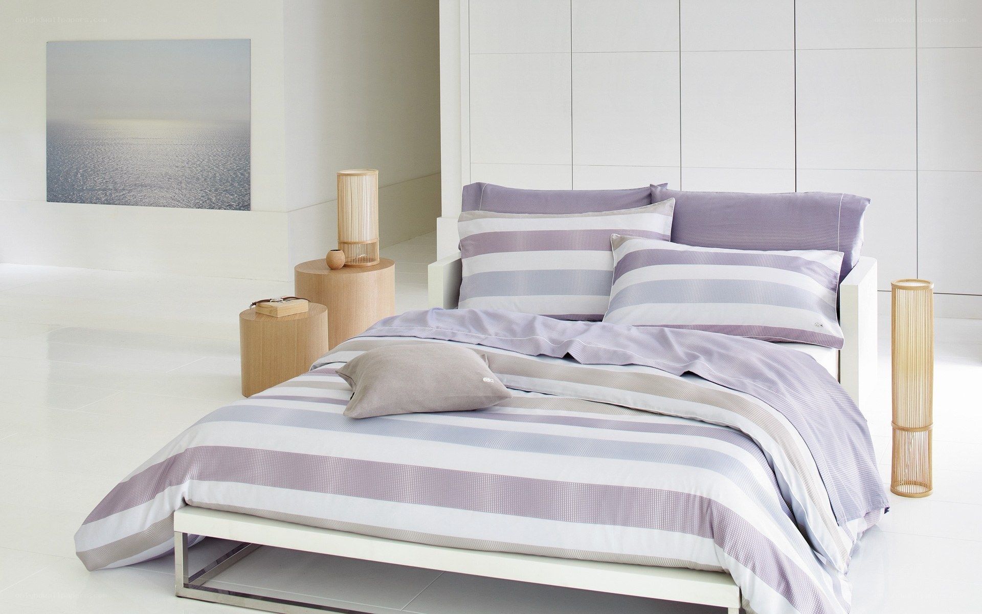 Modern bedroom with striped bedding