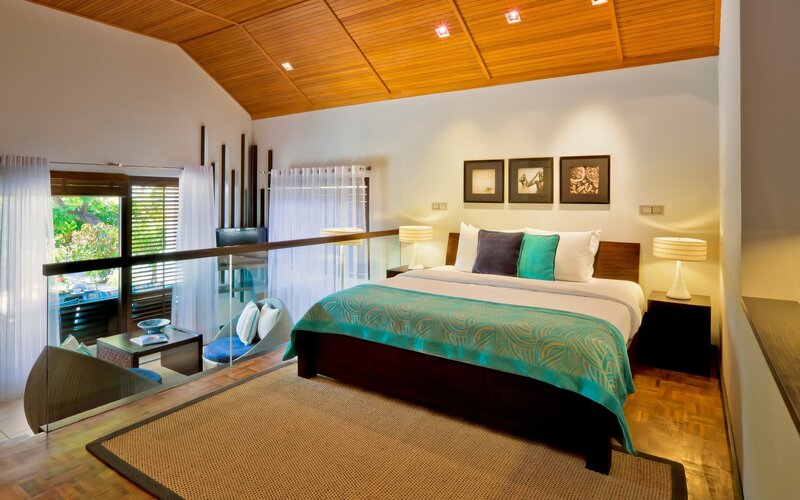 Modern bedroom with wooden ceiling