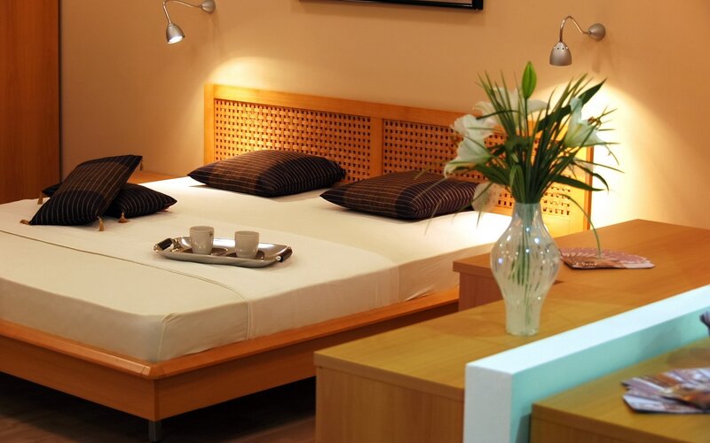 modern bedroom with wooden furniture