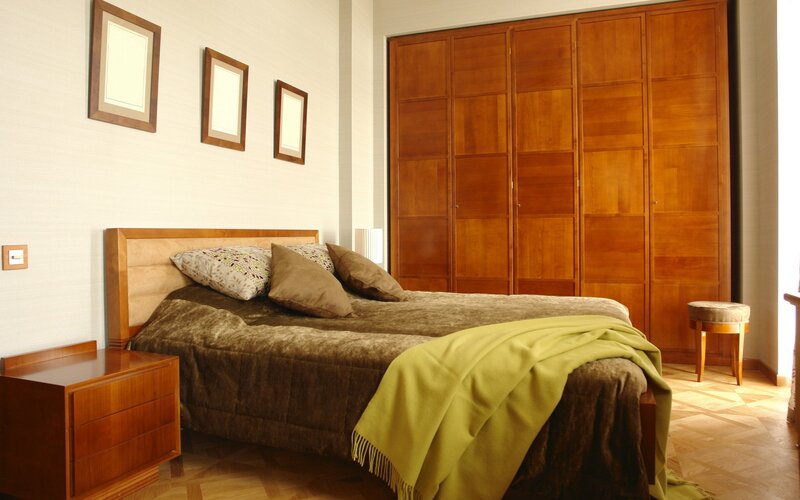 Modern bedroom with wooden furniture