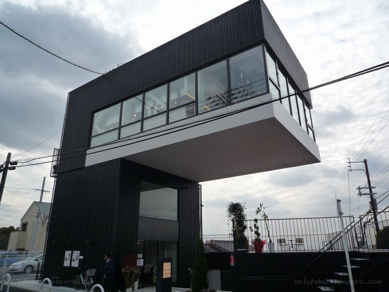 Modern black building with cantilevered design