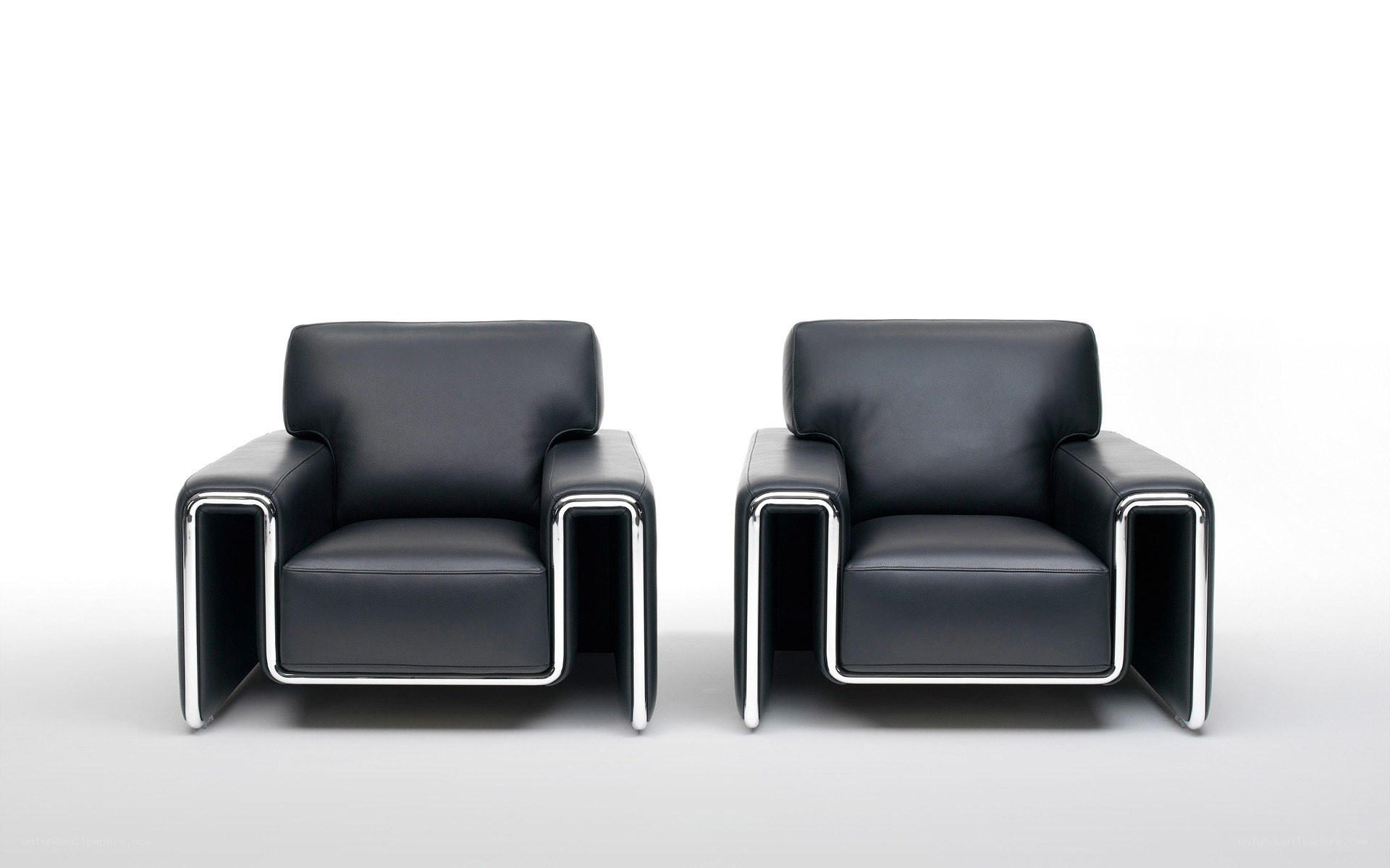 Modern black leather armchairs