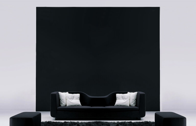 Modern black sofa in minimalist room