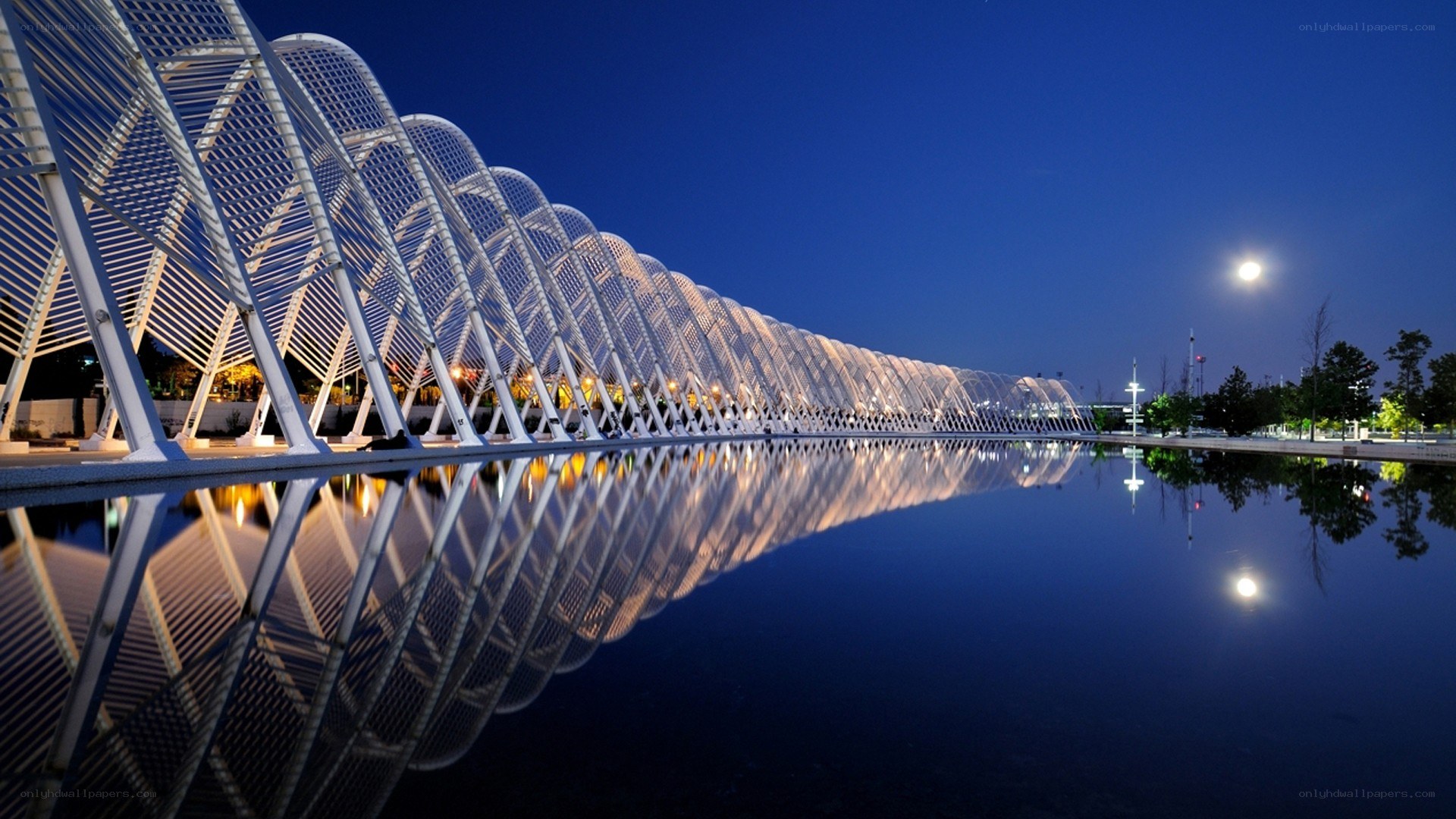 Modern bridge at night with moon