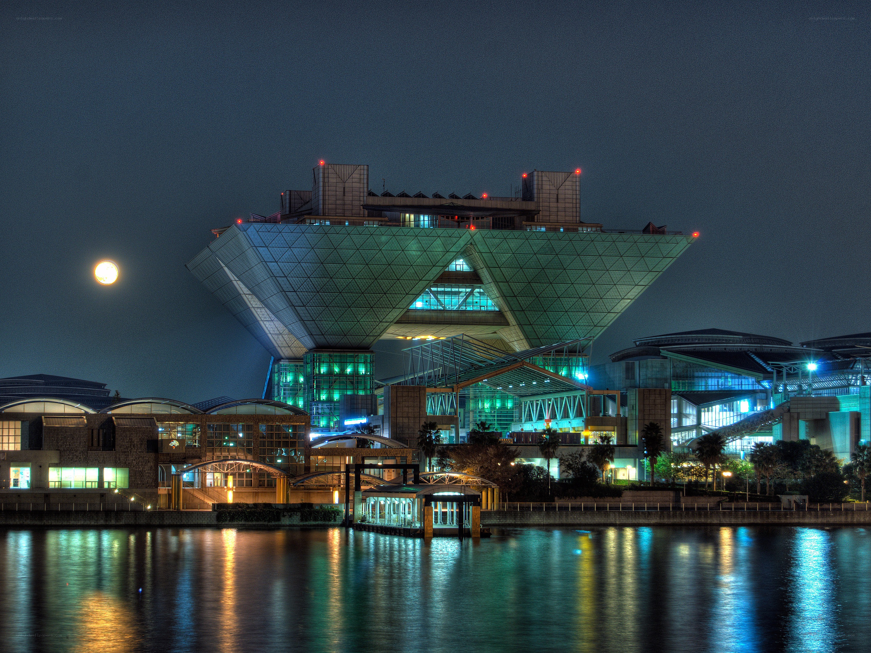 modern building at night with moon