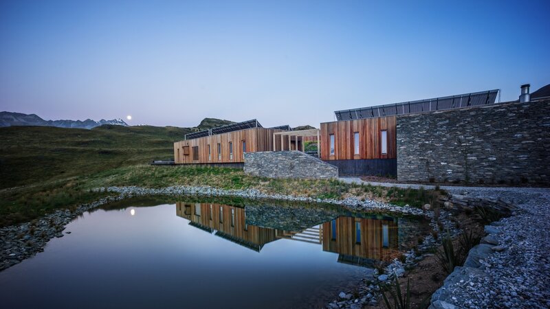 Modern Building by Pond