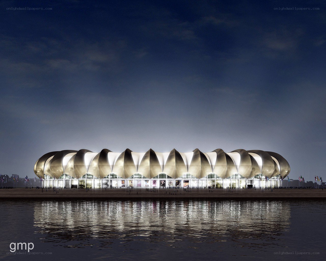 modern building by water at night