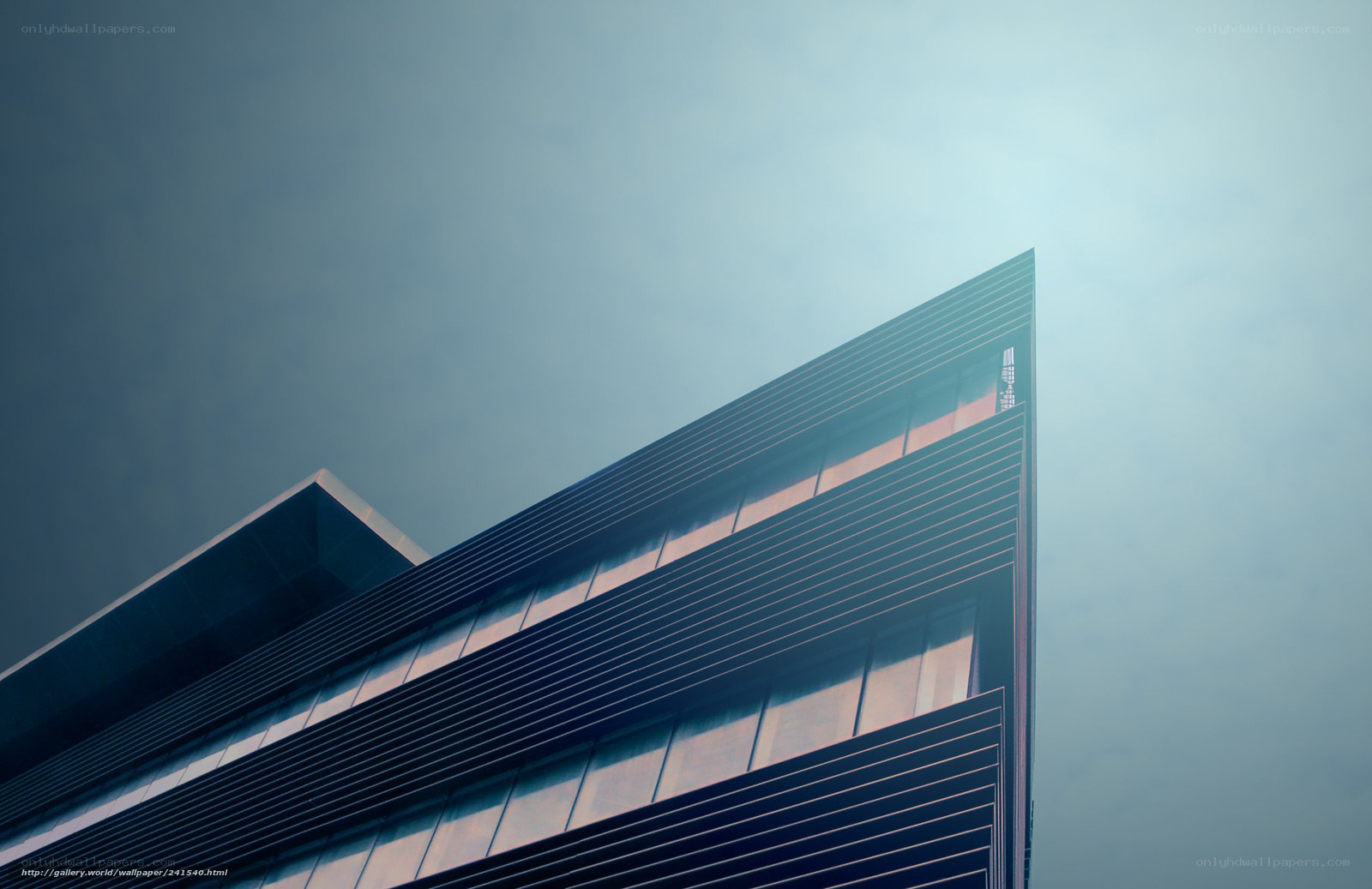 Modern building corner against sky