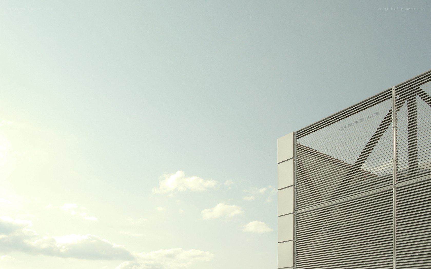 Modern building facade against sky