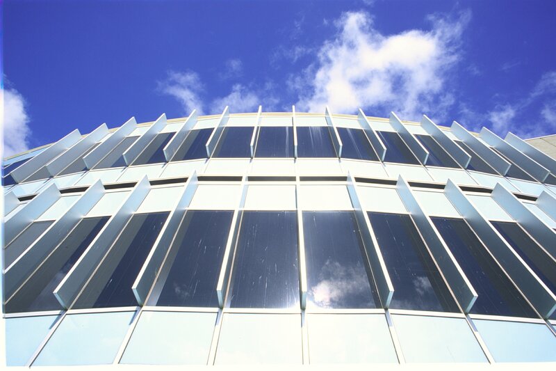 Modern Building Facade — Blue, Dramatic, Afternoon, Photograph, Windows
