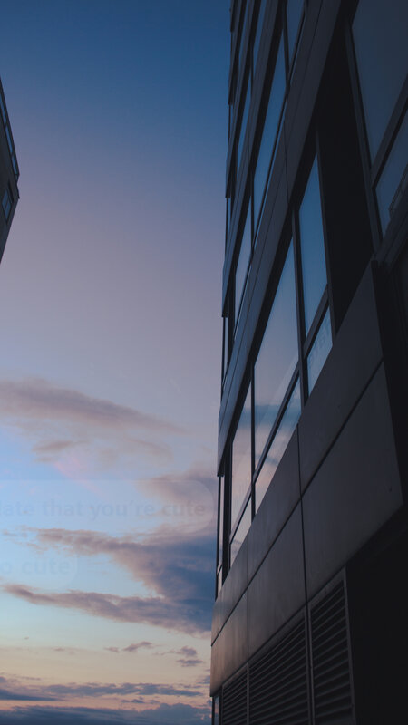Modern Building Facade — Blue, Serene, Sunset