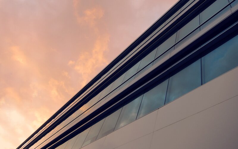 Modern Building Facade — Orange, Dramatic, Sunset