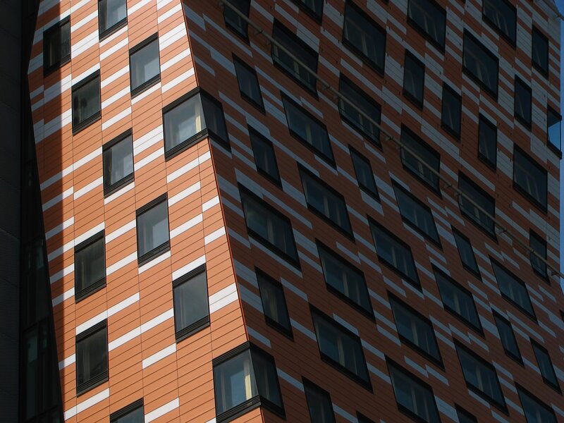 Modern building facade with diagonal stripes